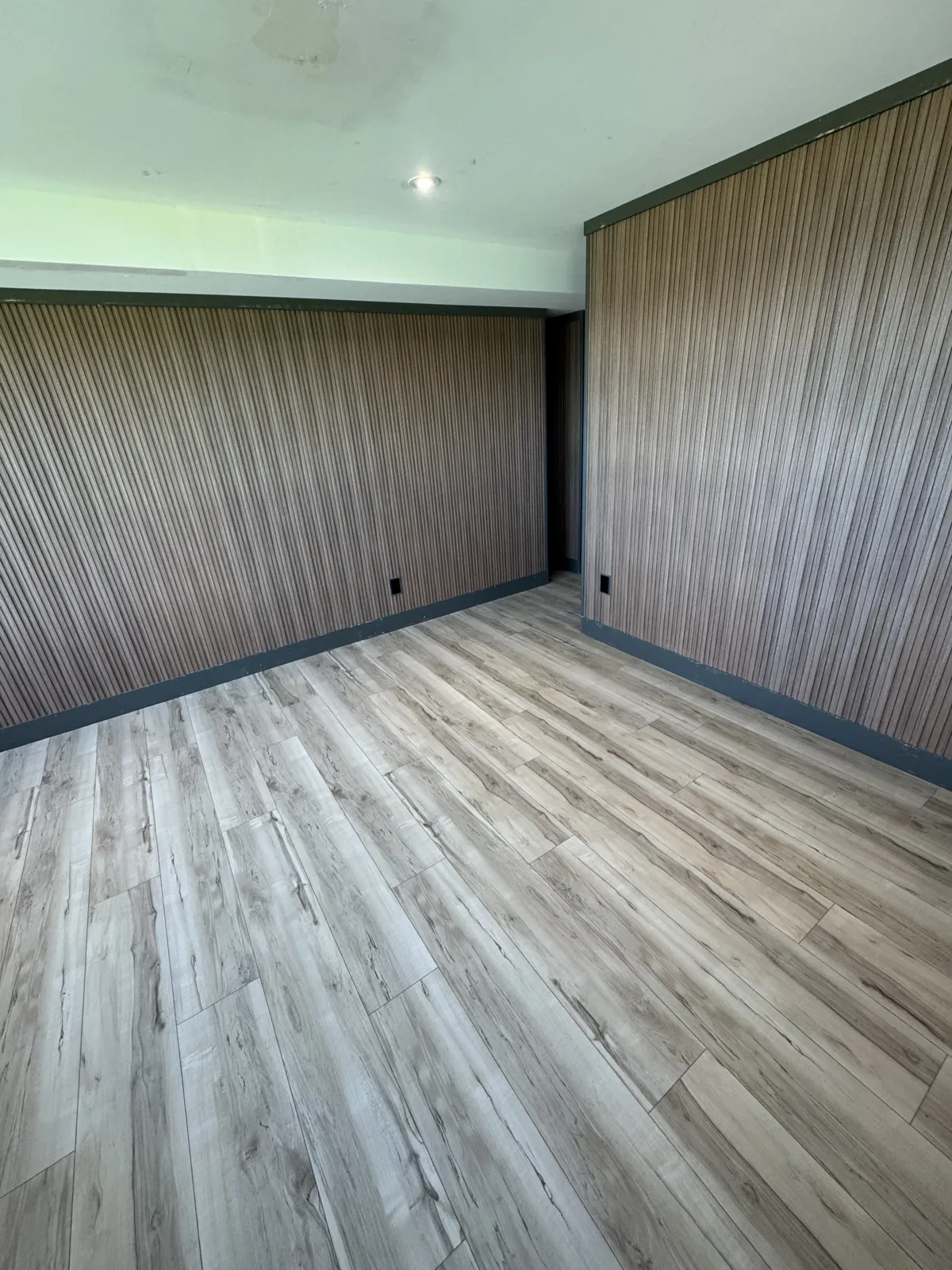 Bathroom renovation with slat wall and vanity